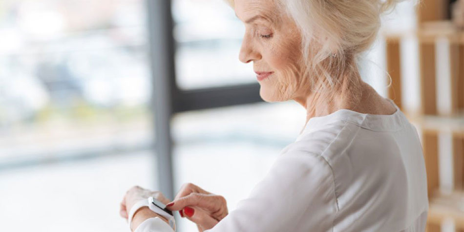 Woman checking her smart watch.